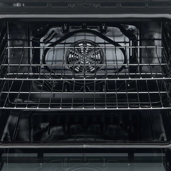 Interior view of the FORNO 30-inch electric range in black from the 2-Piece Appliance Package, featuring a spacious stainless steel oven cavity with multiple rack positions and bright interior lighting—ideal for versatile baking, roasting, and broiling.
