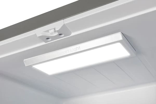 Close-up view of the interior LED lighting inside the FORNO 30-inch French door refrigerator from the 2-Piece Appliance Package, illuminating the shelves and drawers with bright, energy-efficient light for clear visibility and enhanced food organization.