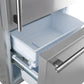 Open view of the freezer drawer in the FORNO 31-inch right-hinge refrigerator in stainless steel, showcasing the spacious lower compartment with organized storage bins for frozen items.