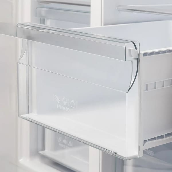 Detailed close-up of the drawers in the FORNO 33-inch side-by-side refrigerator in stainless steel, showing transparent construction and smooth sliding mechanism for easy access to stored items.