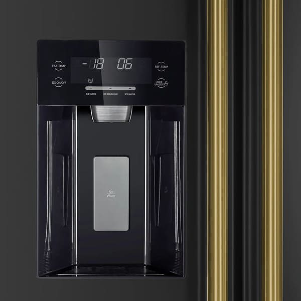 Close-up view of the built-in ice maker inside the FORNO 36-inch side-by-side refrigerator, featuring a compact design with a dedicated ice bin and efficient ice production system.