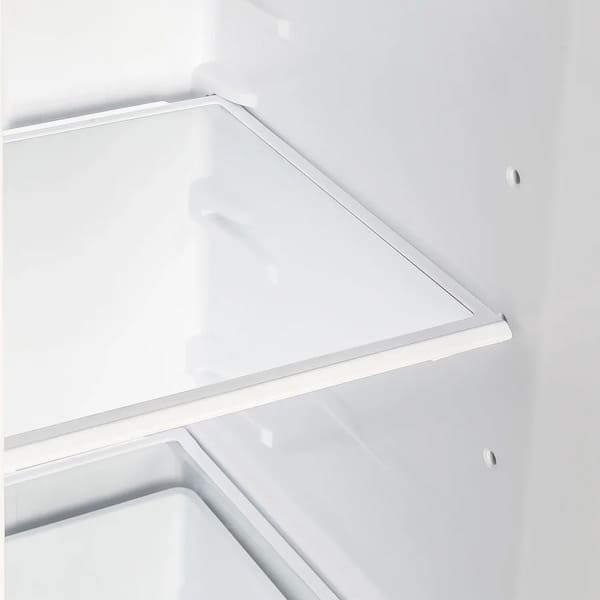 Close-up view of an interior shelf inside the FORNO 36-inch side-by-side refrigerator, highlighting adjustable tempered glass shelving and spacious storage design.