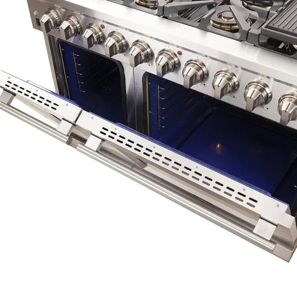 Top-down view of the FORNO 48-inch gas range from the 2-Piece Appliance Package with both oven doors open, revealing the full cooktop layout with 8 burners and the spacious dual oven interiors equipped with multiple rack levels and convection fans for versatile cooking.