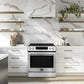 Lifestyle view of the FORNO 30-inch induction range in stainless steel, stylishly built into a contemporary kitchen with coordinated cabinetry, backsplash, and countertop decor.