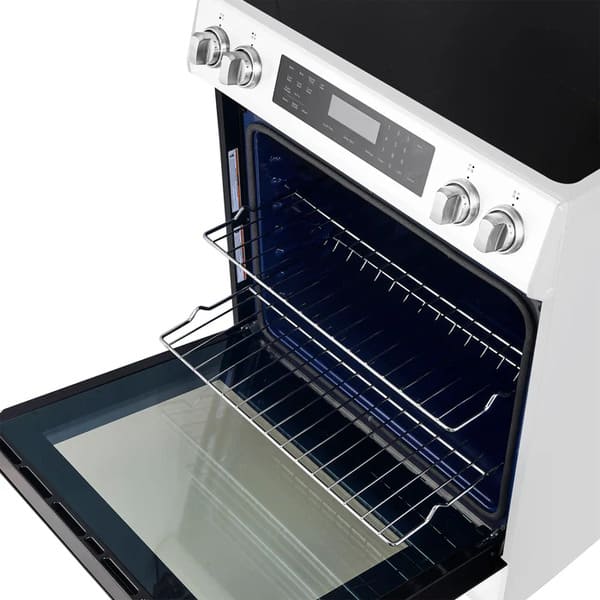 Interior view of the FORNO 30-Inch Induction Range in White, highlighting multiple oven racks and a spacious cavity designed for versatile cooking and baking needs.