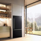 Lifestyle image of the FORNO 31-Inch Refrigerator with Right Hinge in Black, integrated into a contemporary kitchen setting, highlighting its sleek finish and compact, space-saving design.