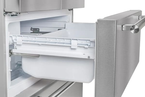 Interior view of the upper drawer in the FORNO 36-inch French door refrigerator in stainless steel, designed for organized storage of fresh food items.