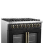 Left-angled view of the FORNO Galiano 36-Inch Dual Fuel Range in black, showcasing the control panel with zinc-coated knobs and bezel ring detailing.
