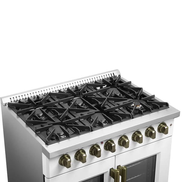 Left-angle view of the cooktop on the FORNO Galiano 36-Inch French Door Dual Fuel Range in white, featuring six sealed gas burners with continuous cast iron grates and antique brass accents.