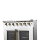 Right-angled close-up of the control knobs on the FORNO Galiano 36-Inch French Door Gas Range in white, featuring antique brass accents, illuminated bezels, and precise burner control layout.