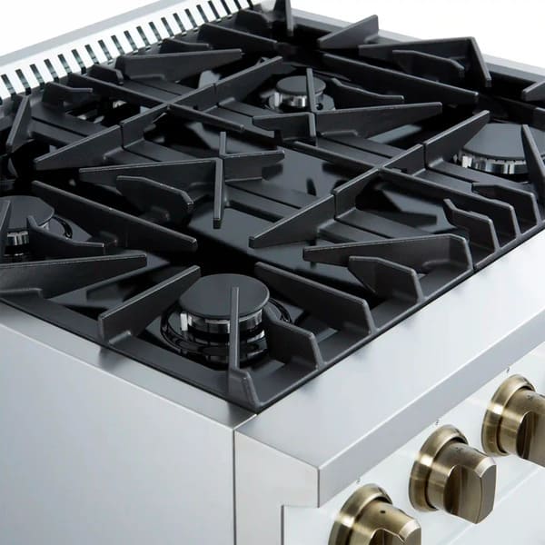 Left-angled view of the cooktop on the FORNO Marco 30-Inch Gas Range in white, featuring four sealed brass burners and continuous cast iron grates for smooth cookware movement and professional performance.