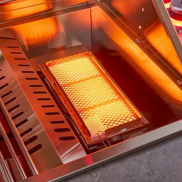 Side view of the FORNO Rimini 30-Inch Outdoor Kitchen showing the built-in infrared side burner, featuring a stainless steel cooking surface and high-heat ceramic element, ideal for searing meats and quick outdoor cooking tasks.