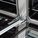 Close-up of the oven door hinges on the Forno Antico 48-Inch Gas Range in white, showcasing heavy-duty hinge construction designed for smooth door movement and long-lasting durability.