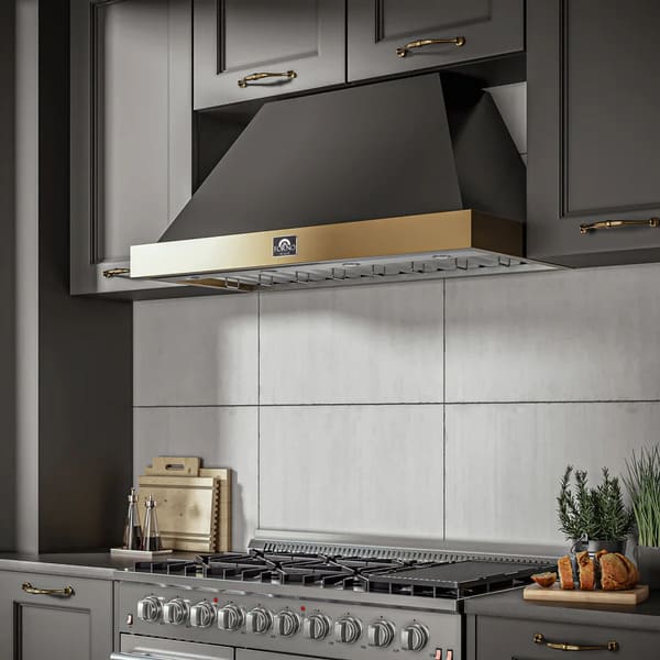 Stylish kitchen interior featuring the Forno Vittorio 48-Inch Wall Mount Range Hood in black with antique brass trim, mounted above a professional-grade cooktop. The hood complements the modern cabinetry and upscale design while providing powerful ventilation.