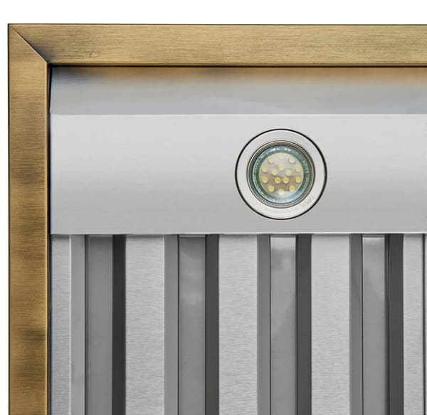 Close-up of the Forno Vittorio Wall Mount Range Hood’s built-in LED lights, illuminating the cooktop area with bright, energy-efficient lighting integrated beneath the hood canopy.