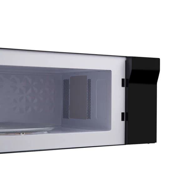 Right angled view of Forno Padula 30-Inch Over-the-Range Microwave with door open, showing spacious interior and stainless steel exterior.