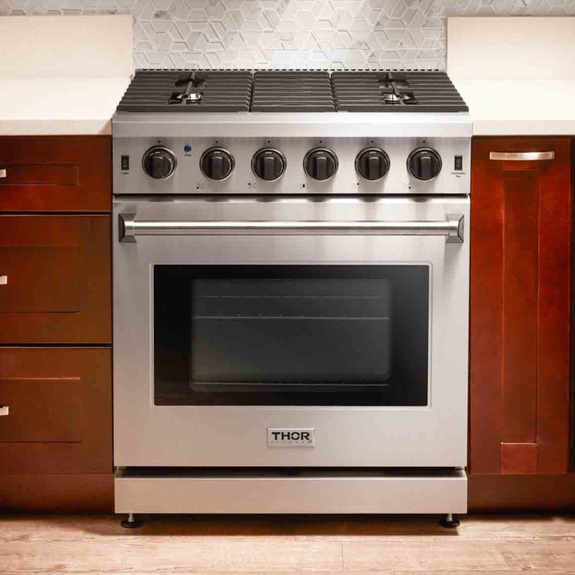 Thor Kitchen 4-Piece Appliance Package - 30-Inch Gas Range, Refrigerator with Water Dispenser, Wall Mount Hood, & Dishwasher in Stainless Steel