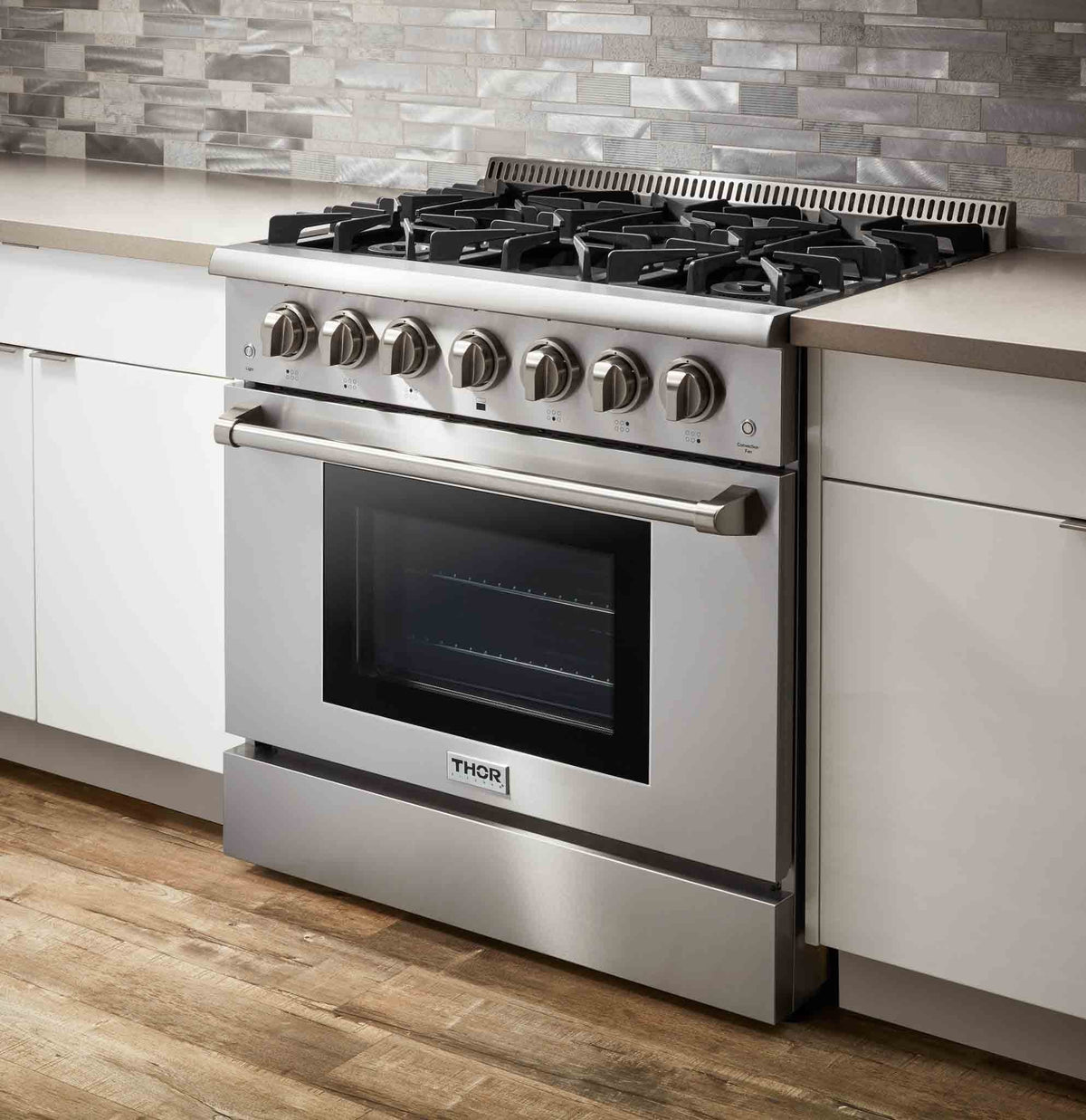 Thor Kitchen 4-Piece Pro Appliance Package - 36-Inch Gas Range, Refrigerator with Water Dispenser, Pro-Style Wall Mount Hood & Dishwasher in Stainless Steel