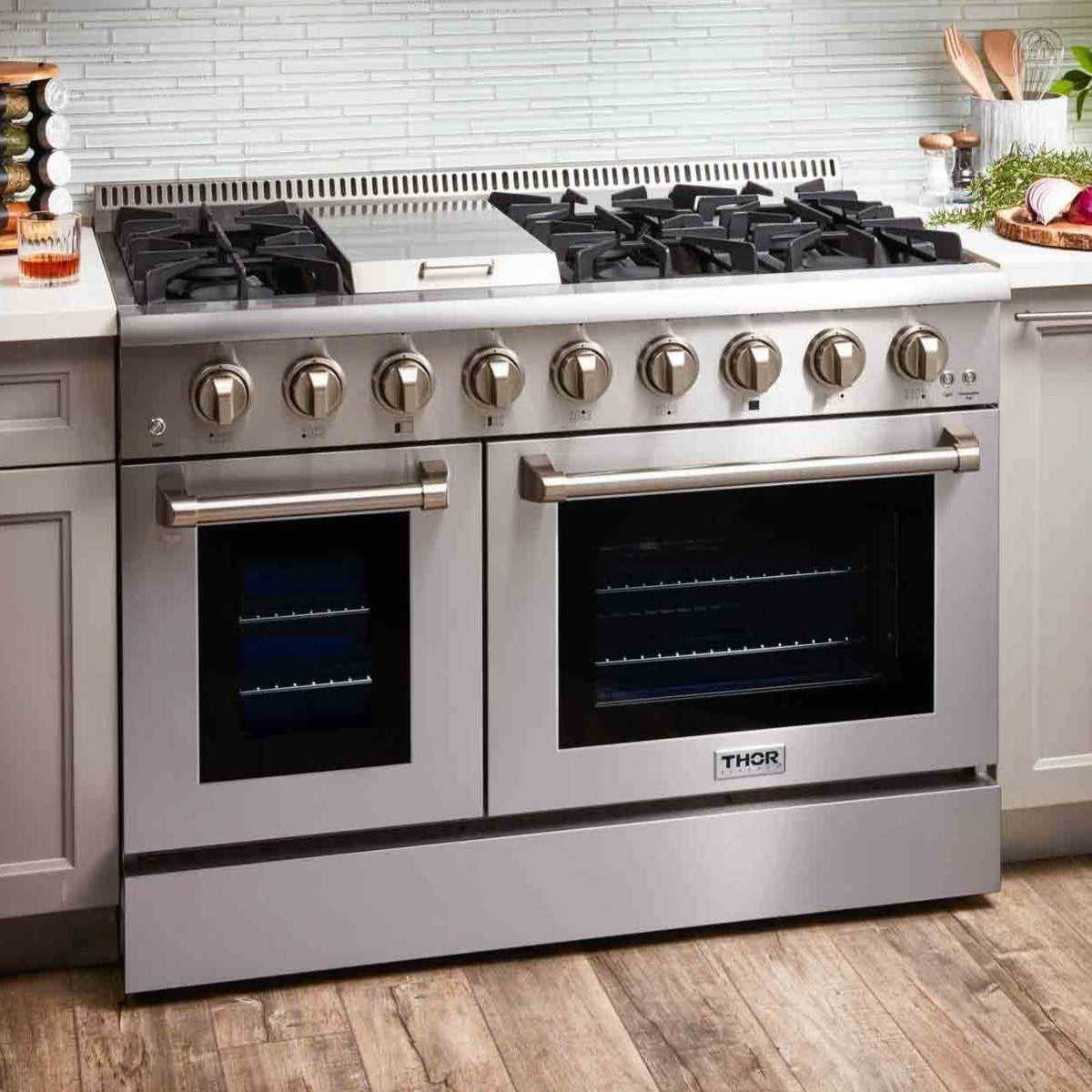 Thor Kitchen 4-Piece Pro Appliance Package - 48-Inch Gas Range, Pro Wall Mount Hood, French Door Refrigerator, and Dishwasher in Stainless Steel